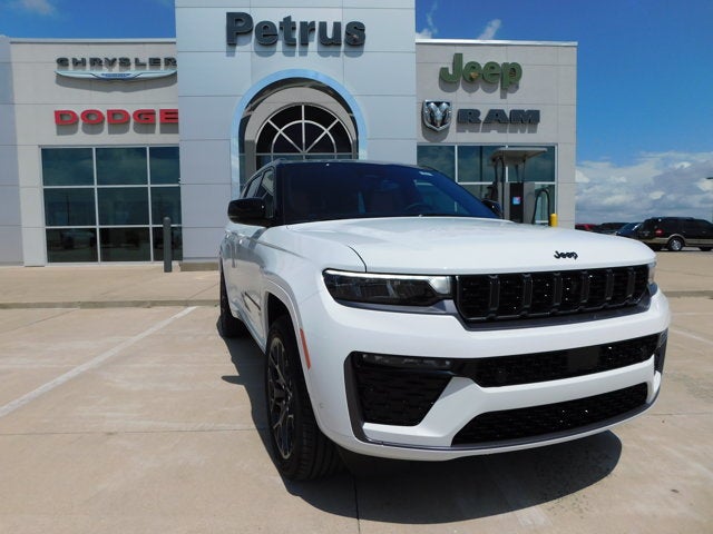 2026 Jeep Grand Cherokee GRAND CHEROKEE L SUMMIT 4X4 in Bright White Clear-Coat Exterior Paint — front three-quarter view