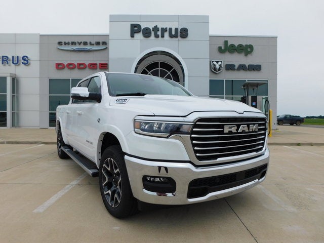 2026 RAM Ram 1500 RAM 1500 LARAMIE CREW CAB 4X4 5'7' BOX in Bright White Clear-Coat Exterior Paint — front three-quarter view