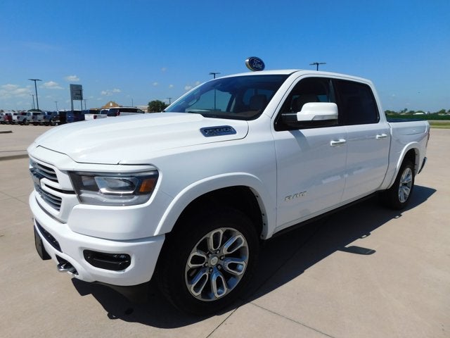 2022 RAM 1500 Laramie Crew Cab 4x4 5'7' Box in Bright White Clearcoat — front three-quarter view