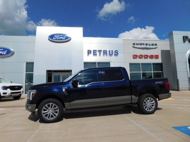 2025 Ford F-150 King Ranch in Dark Blue — front three-quarter view