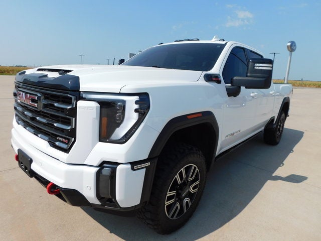 2024 GMC Sierra 2500Hd AT4 in Summit White — front three-quarter view