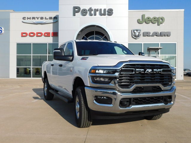 2026 RAM Ram 2500 RAM 2500 TRADESMAN CREW CAB 4X4 6'4' BOX in Bright White Clear-Coat Exterior Paint — front three-quarter view